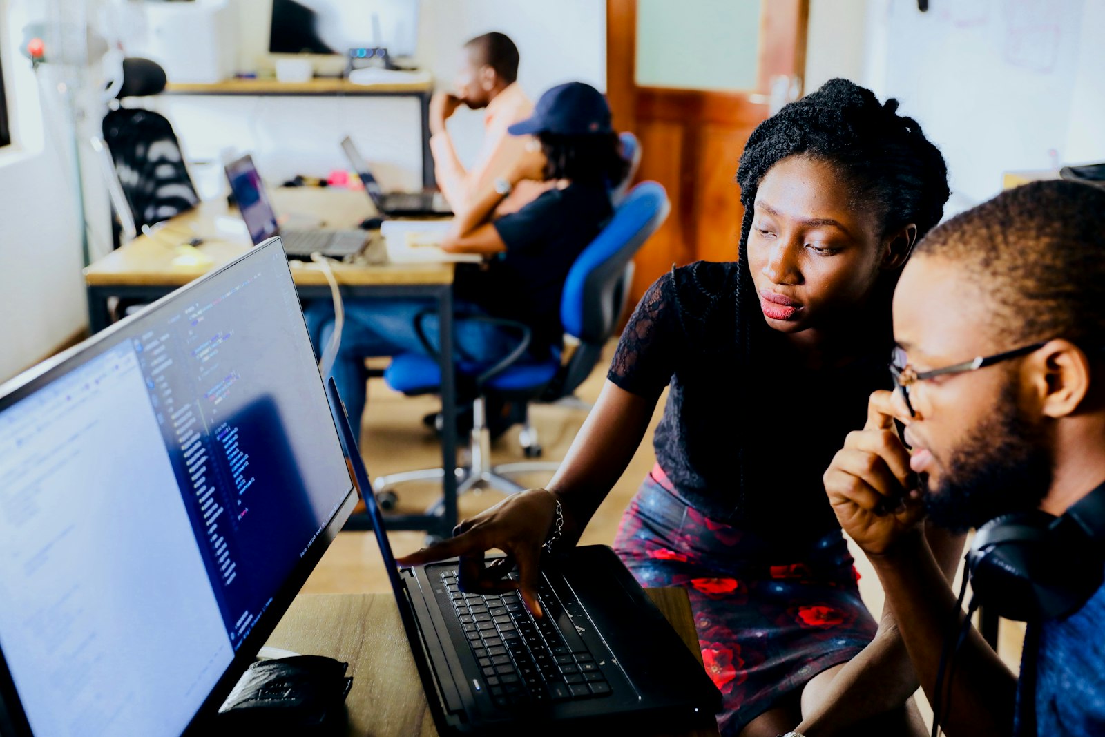 MAXBLO developers working together